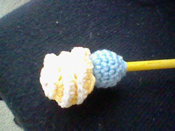 Step Four_ Attach rose to ball attached to dowel